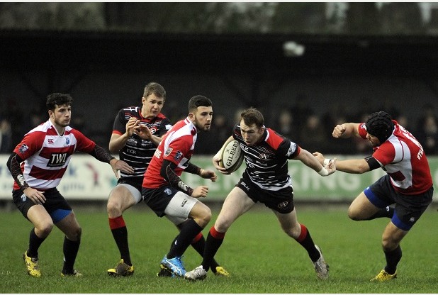 Cornish Pirates, centre Max Bodilly hands off Cardiff Blues Aled Summerhill.